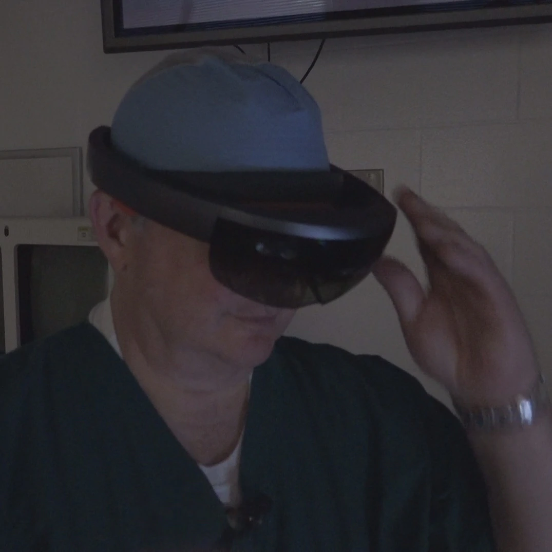 Dr. Crossley practicing implants using extended reality (XR) technology.