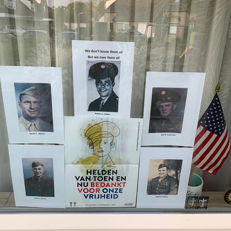 Vivian Gadet's window display honors American soldier Robert Fischer, killed in World War II
