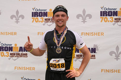 Mike after finishing an Ironman in 2018.